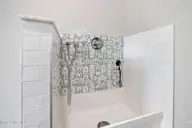 1748 Oakbrook Drive SW, Ocean Isle Beach, NC 28469 — 4-bedroom home in Brick Landing, Ocean Isle Beach, NC, photo 24 of 77: Pet Washing Station