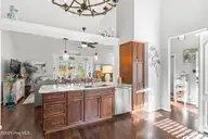 7568 Dunbar Drive SW, Sunset Beach, NC 28468 — 3-bedroom waterfront home in Sandpiper Bay, Sunset Beach, NC, photo 9 of 51: Opens into living area