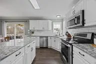 211 Windham Lane, Jacksonville, NC 28540 — 4-bedroom home in Williamsburg Plantation, Jacksonville, NC, photo 10 of 51: 11-web-or-mls-211 Windham Ln. 25
