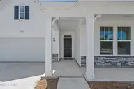 1727 Saucepan Bay Drive SW, Shallotte, NC 28470 — 3-bedroom home in Creekview Landing, Shallotte, NC, photo 5 of 38: Front Entrance and Porch