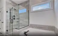 3407 Discovery Bay Road, Shallotte, NC 28470 — 4-bedroom home in Solserra, Shallotte, NC, photo 12 of 31: Owner's Bath - Tub Option
