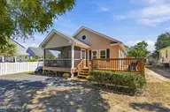 166 NE 5th Street, Oak Island, NC 28465 — 3-bedroom home in Tranquil Harbor, Oak Island, NC, photo 4 of 59: 3_back right exterior