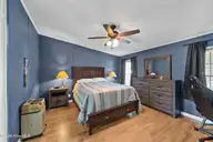 195 Calabash Road NW, Calabash, NC 28467 — 3-bedroom manufactured home in Carolina Shores, Calabash, NC, photo 20 of 37: Primary Bedroom