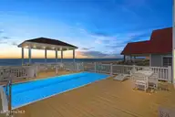 2205 E Beach Drive, Oak Island, NC 28465 — 6-bedroom waterfront home in Long Beach, Oak Island, NC, photo 3 of 55