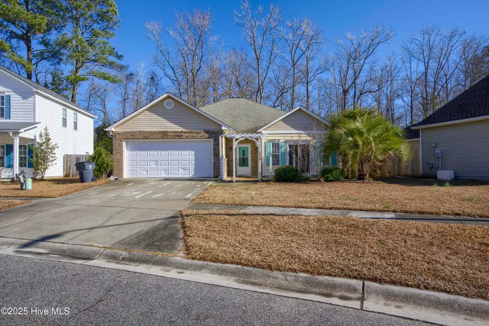 1020 Lake Norman Lane, Leland, NC 28451 — 3-bedroom home in Lake Forest Village, Leland, NC, photo 1 of 20: 1020 Norman Lake - Exterior - Edited_4