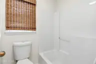 212 Kings Trail # A, Sunset Beach, NC 28468 — 3-bedroom townhome in Sea Trail Plantation, Sunset Beach, NC, photo 23 of 65: Upstairs guest bathroom