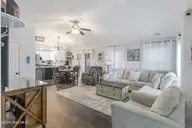 1803 W Yacht Drive, Oak Island, NC 28465 — 3-bedroom home in Pinners Point, Oak Island, NC, photo 6 of 39: Living Room