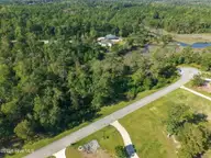 20 20 Summer Rest Trail, Hubert, NC 28539 — lot in The Bluffs at Starling Point, Hubert, NC, photo 5 of 16: Aerial 4