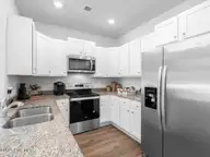 4254 Allsbrook Lane Unit 1013, Leland, NC 28451 — 3-bedroom townhome in Indigo Preserve, Leland, NC, photo 10 of 39: Kitchen Area