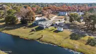 2157 Lakeside Avenue SW, Supply, NC 28462 — 3-bedroom waterfront manufactured home in Lakeside, Supply, NC, photo 1 of 53: 48_drone