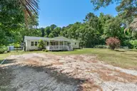 13290 New Britton Highway E, Nakina, NC 28455 — 3-bedroom home, Nakina, NC, photo 4 of 74: Front Yard