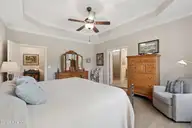 3014 Pine Bloom Way, Leland, NC 28451 — 4-bedroom home in Brunswick Forest, Leland, NC, photo 24 of 69: Primary bedroom