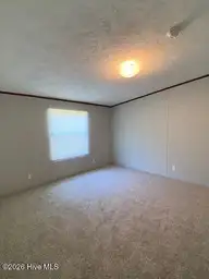 1951 Stanley Road SW, Supply, NC 28462 — 4-bedroom manufactured home, Supply, NC, photo 16 of 27: Bedrm 2