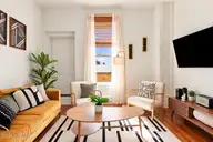 21 N Front Street 3b1, Wilmington, NC 28401 — 1-bedroom condo in Historic District, Wilmington, NC, photo 12 of 32: 8-living_room_window