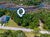 232 1009 Kings Creek Crossing, Holly Ridge, NC 28445 — waterfront lot in Summerhouse On Everett Bay, Holly Ridge, NC, photo 1 of 30: Lot 1009-232 Kings Creek Crossing MLS-2