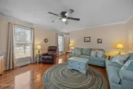 2573 Graham Street, Winterville, NC 28590 — 5-bedroom home in Olive Gardens, Winterville, NC, photo 14 of 41: Family room 2