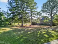 8815 10 Carenden Court, Sunset Beach, NC 28468 — waterfront lot in Thistle Downs, Sunset Beach, NC, photo 3 of 22: DJI_0026
