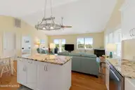 6611 Marsh Cove Road, Emerald Isle, NC 28594 — 3-bedroom waterfront home in Marsh Cove, Emerald Isle, NC, photo 14 of 52: Kitchen with granite countertops