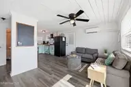 100 E Bogue Sound Drive, Atlantic Beach, NC 28512 — 4-bedroom waterfront home, Atlantic Beach, NC, photo 13 of 52: living room