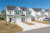 222 Sandpiper Place, Holly Ridge, NC 28445 — 3-bedroom townhome in Coastal Village, Holly Ridge, NC, photo 1 of 25: 220-222 Sand Piper - Exterior - Edited_6