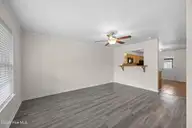 27 E Doris Avenue 111, Jacksonville, NC 28540 — 2-bedroom townhome in Doris Place, Jacksonville, NC, photo 8 of 29: 10_living room