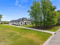 47 E Rolling Meadows Road, Hampstead, NC 28443 — 4-bedroom home in Whitebridge, Hampstead, NC, photo 4 of 72: 11-web-or-mls-DJI_20260413124953_0677_D