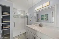 5127 W Beach Drive, Oak Island, NC 28465 — 5-bedroom waterfront home, Oak Island, NC, photo 15 of 73: 27_bathroom