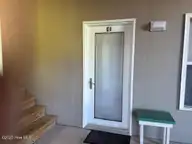 100 Lighthouse Lane C1, Cedar Point, NC 28584 — 2-bedroom condo in Village at Magens Bay, Cedar Point, NC, photo 2 of 19: Front Door