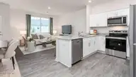 605 Wilder Bloom Path, Aberdeen, NC 28315 — 3-bedroom townhome in Martin Farms, Aberdeen, NC, photo 5 of 23: Kitchen