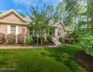 62 Stoneykirk Drive, Pinehurst, NC 28374 — 3-bedroom home in Pinewild CC, Pinehurst, NC, photo 1 of 50: 260626-62StoneyKirk-0564