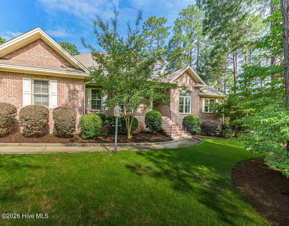 62 Stoneykirk Drive, Pinehurst, NC 28374 — 3-bedroom home in Pinewild CC, Pinehurst, NC, photo 1 of 50: 260626-62StoneyKirk-0564