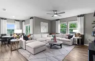 307 Currents Place SE 07401, Bolivia, NC 28422 — 4-bedroom home in Ocean Pointe, Bolivia, NC, photo 2 of 11: Untitled design - Ibis Family Room