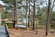 116 Shagbark Court, West End, NC 27376 — 3-bedroom waterfront home in Seven Lakes North, West End, NC, photo 22 of 65: Front Right Side View