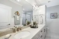 202 NE 64th Street, Oak Island, NC 28465 — 3-bedroom home, Oak Island, NC, photo 21 of 49: Ensuite full bathroom