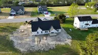 120 Grandview Drive, Elizabeth City, NC 27909 — 4-bedroom waterfront home in Tooley Harbor, Elizabeth City, NC, photo 4 of 8: dji_fly_20260326_223322_280_177504863794