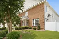 4034 Townes Court N, Wilson, NC 27896 — 4-bedroom townhome in The Townes at Lake Wilson, Wilson, NC, photo 2 of 52: Front 2