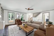 2400 Surry Road NW, Wilson, NC 27896 — 4-bedroom home in Cedar Run, Wilson, NC, photo 6 of 35: 07-2400 Surry Rd NW-Living Room_FINAL