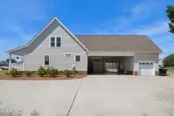 105 Franklin Court, Cedar Point, NC 28584 — 3-bedroom waterfront home in Cedar Point Beach, Cedar Point, NC, photo 8 of 53: 8 Side of home