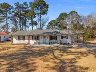 113 Wellington Drive, Wilmington, NC 28411 — 3-bedroom home in Queens Point, Wilmington, NC, photo 1 of 52: 71-web-or-mls-DJI_20260206131239_0097_D