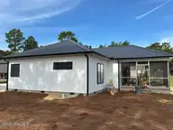 179 Erfie Drive S, Pinebluff, NC 28373 — 2-bedroom home in The Pines, Pinebluff, NC, photo 12 of 13: RT Side