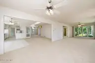 809 Thyme Court, New Bern, NC 28562 — 3-bedroom home in Greenbrier, New Bern, NC, photo 8 of 74: 809 Thyme Sun Room and Dining
