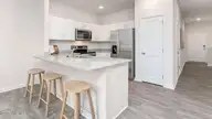 605 Wilder Bloom Path, Aberdeen, NC 28315 — 3-bedroom townhome in Martin Farms, Aberdeen, NC, photo 3 of 23: Kitchen