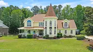 108 Gazebo Court, Wilmington, NC 28409 — 4-bedroom waterfront home in Inlet Point Harbor, Wilmington, NC, photo 1 of 60: 108GazeboCourtDrone-1