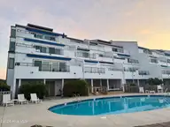 351 Salter Path Road 402, Pine Knoll Shores, NC 28512 — 3-bedroom waterfront condo in Bogue Shore Club, Pine Knoll Shores, NC, photo 5 of 15: Exterior Beach Side