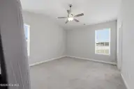 304 Mizzen Way, Elizabeth City, NC 27909 — 3-bedroom home in Tooley Harbor, Elizabeth City, NC, photo 23 of 44: Primary Bedroom