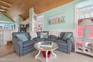 112 Sandpiper Court, Atlantic Beach, NC 28512 — 3-bedroom waterfront home in Sea Dreams, Atlantic Beach, NC, photo 13 of 50: living room