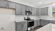 300 Maddox Drive, Aberdeen, NC 28315 — 5-bedroom home in Martin Farms, Aberdeen, NC, photo 5 of 33: Kitchen
