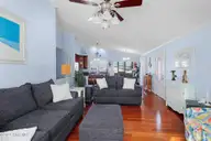 102 Freeman Lane, Atlantic Beach, NC 28512 — 3-bedroom home in Club Colony, Atlantic Beach, NC, photo 17 of 64: Living Room with Hardwood Floors