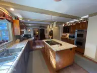 80 Wilson Road, Pinehurst, NC 28374 — 3-bedroom home in Unit 2, Pinehurst, NC, photo 23 of 74: Kitchen Island