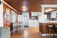 4025 E Beach Drive, Oak Island, NC 28465 — 3-bedroom waterfront home in Long Beach, Oak Island, NC, photo 13 of 40: 45-web-or-mls-CAMMediaLLC.com (45 of 47)